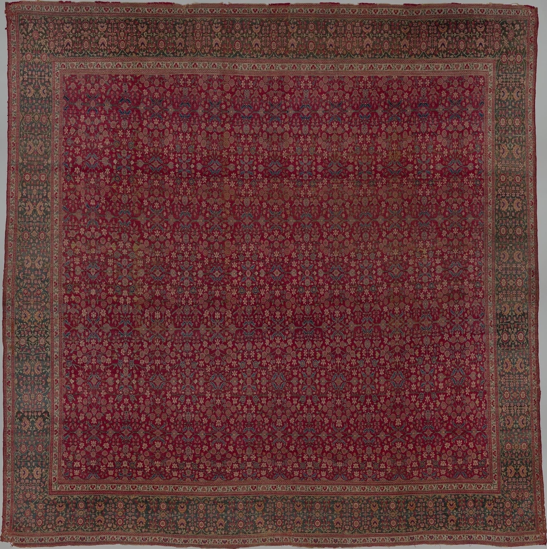 Kashmir Millefleur Ruby, a hand-knotted silk rug, shown flat