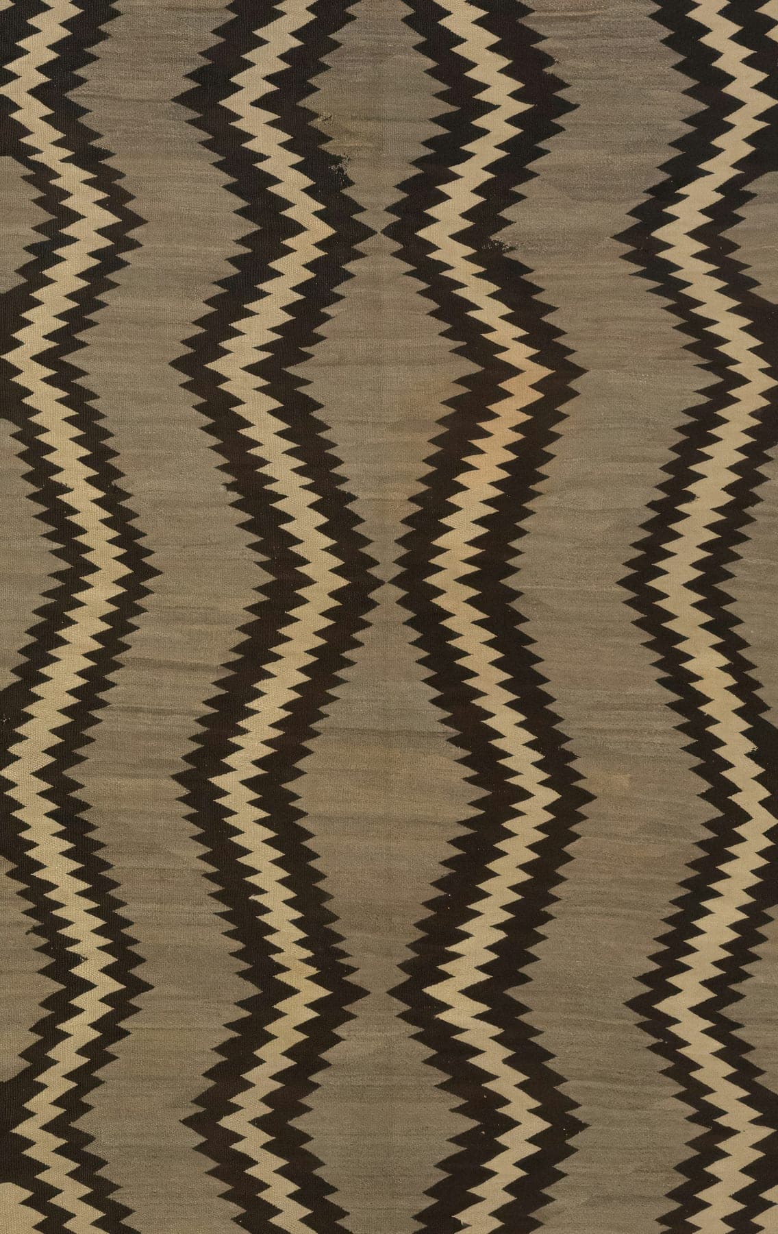 Berber Stripe, a flat-woven wool and jute rug, shown flat