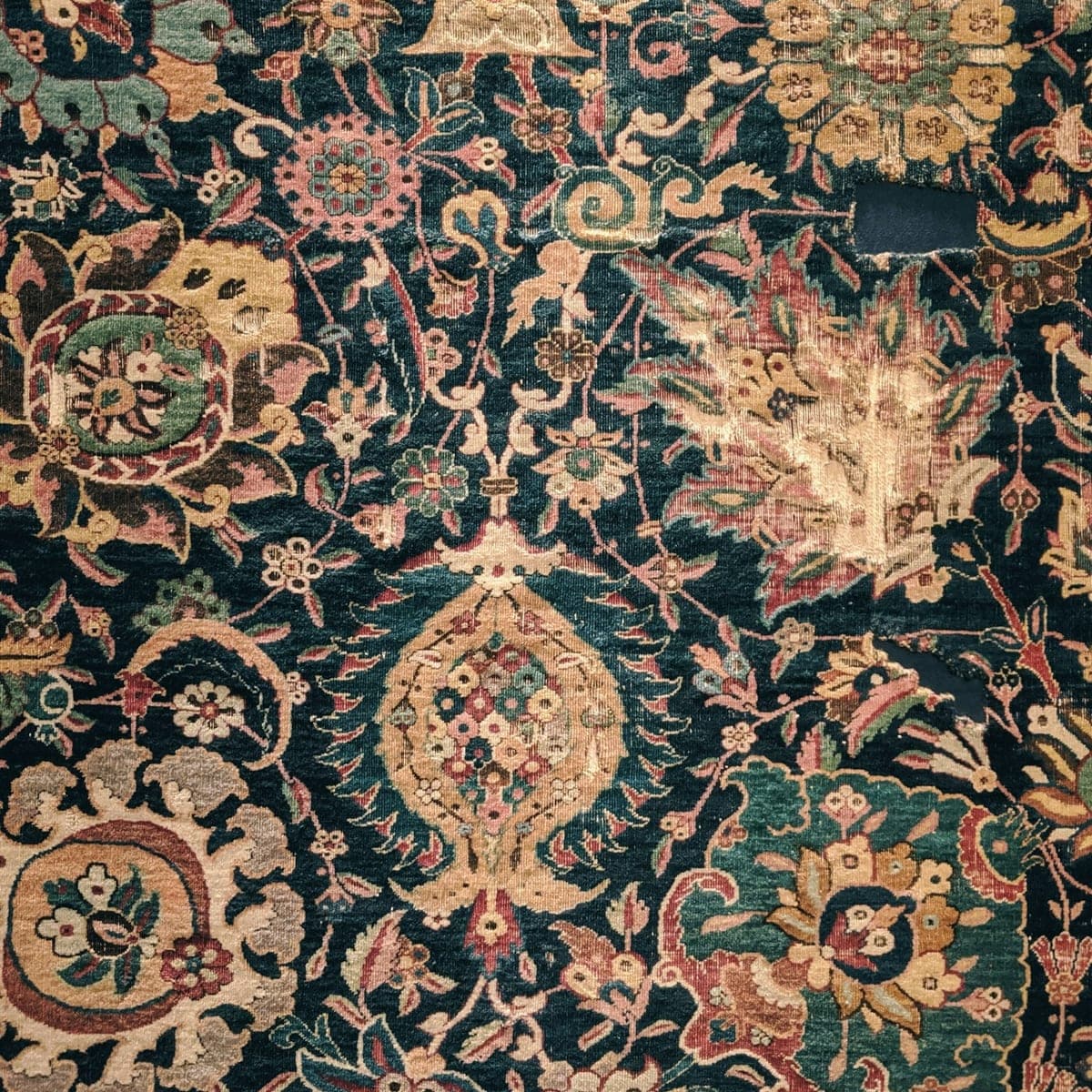 Close-up of the floral pattern on the Mashhad Indigo Bloom