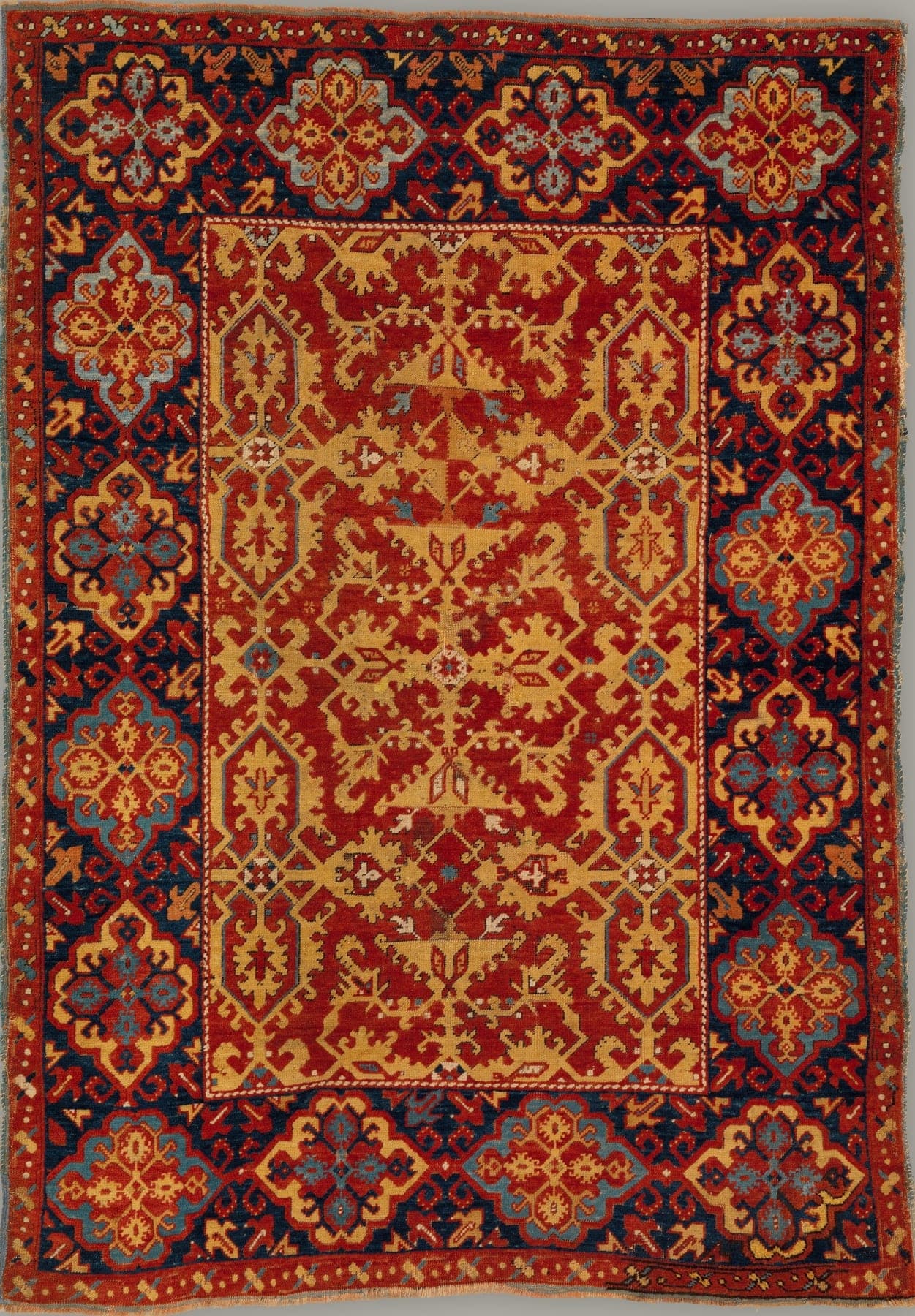 Ornamental Lotto Ember, a hand-knotted wool rug, shown flat