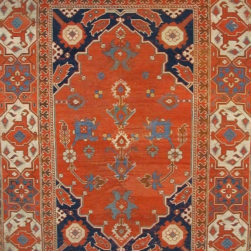 Close-up of the medallion pattern on the Oushak Faded Sage